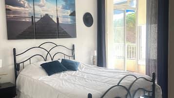 2 habitaciones, tabla de planchar con plancha, wifi y ropa de cama