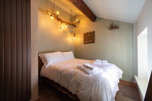 2 quartos, berço de viagem, Wi-Fi de cortesia, roupa de cama