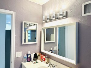 Hair dryer, towels, soap, shampoo