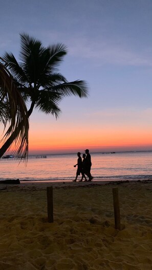 On the beach, sun loungers, beach umbrellas, beach towels