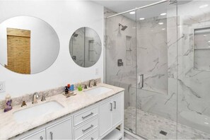 Hair dryer, towels, soap, shampoo