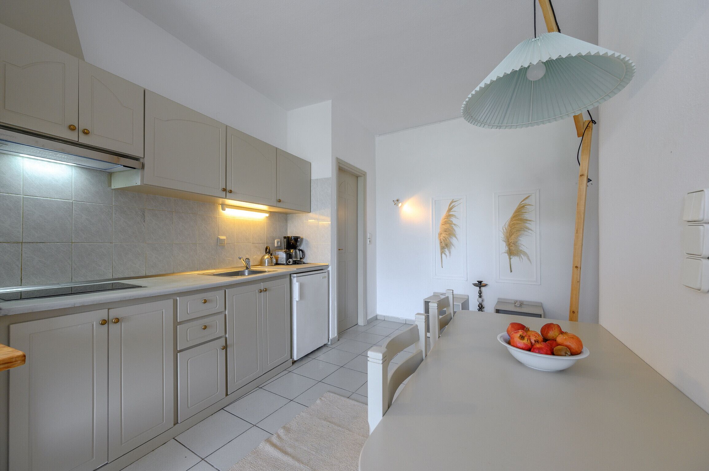 Fridge, coffee/tea maker, electric kettle, toaster