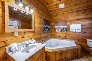 Jetted bath, hair dryer, towels, soap