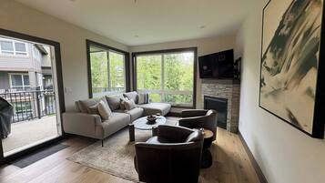 Polar Peak Lodges #38 | Living area | 40-inch flat-screen TV with cable channels, fireplace