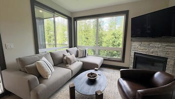 Polar Peak Lodges #38 | Living area | 40-inch flat-screen TV with cable channels, fireplace