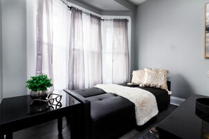 Apartamento Deluxe | Zona de estar