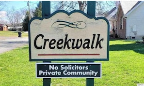 A sign for Creekwalk, a private community with no solicitors. - Cozy Cottage (Pigeon Forge)