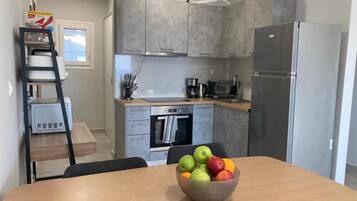 Villa | Private kitchen | Fridge, microwave, oven, stovetop