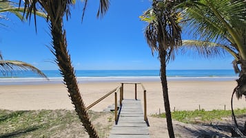 On the beach, white sand, free beach cabanas, sun-loungers