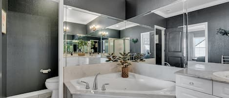 Jetted tub, hair dryer, towels, soap