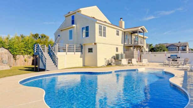 A two-story house with a swimming pool. - Lanikai- POOL/GAME RM/BAY & BCH ACCESS! (Virginia Beach)