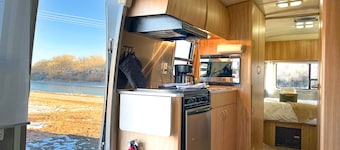 Newly updated Airstream with modern amenities on the bank of the Colorado River.