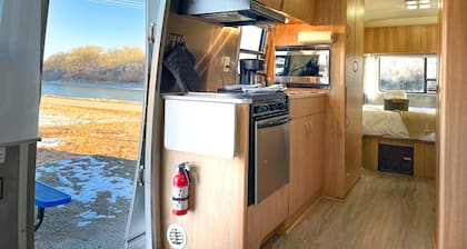 Newly updated Airstream with modern amenities on the bank of the Colorado River.