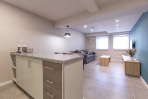 Apartment, 1 Bedroom | Private kitchen | Full-size fridge, microwave, oven, stovetop