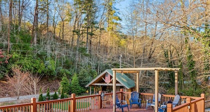 Rustic two-story lakefront cabin near beach with dock, lake & mtn views, & deck