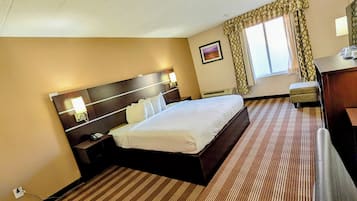 Desk, laptop workspace, blackout drapes, iron/ironing board