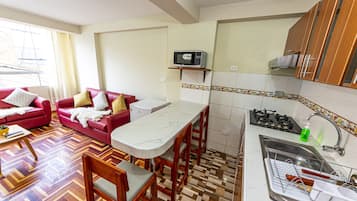 Apartemen Eksekutif | Area keluarga | TV layar datar