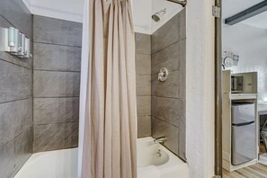 Combined shower/tub, towels, soap, shampoo - Quest Rest - Unit 6 (Colorado Springs)