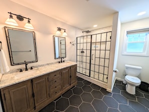 Shower, hair dryer, towels, soap