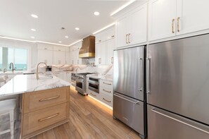 Fridge, microwave, oven, stovetop - Hobbs Realty - Find your "Carolina Joy" in this custom 5-bedroom oceanfront home w/Private Pool! (Holden Beach)