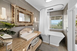 Shower, hair dryer, towels, toilet paper