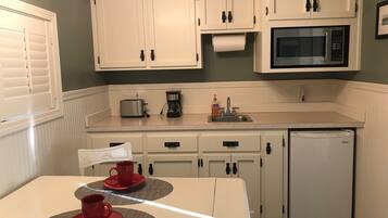 Fridge, microwave, coffee/tea maker, toaster