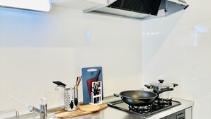 Deluxe Villa, Non Smoking, Mt. Fuji View | Private kitchen | Fridge, microwave, electric kettle, cookware/dishes/utensils - Megu Fuji Plus+ (Fujiyoshida)