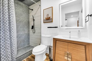 Shower, hair dryer, towels, soap