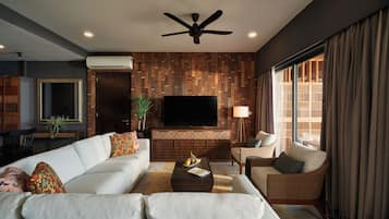 Beachhouse Loft | Living area | 50-inch TV with satellite channels