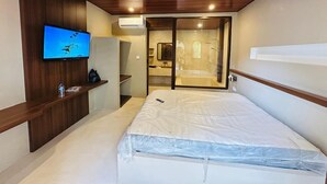 Deluxe Room | Iron/ironing board, WiFi (free), bed sheets - Avaya Bali (Legian)