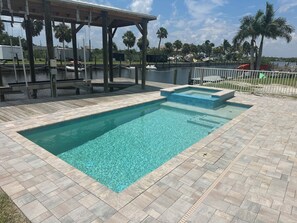 A heated pool - 855 Canal View Gem: Heated Pool, Spa & Trolley Access (Fort Myers Beach)