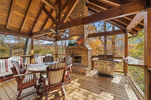 Outdoor dining - NEW! 5BR/6BA Cabin: Indoor Pool, Theater, Hot Tub, Outdoor Fireplace & Views! (Sevierville)