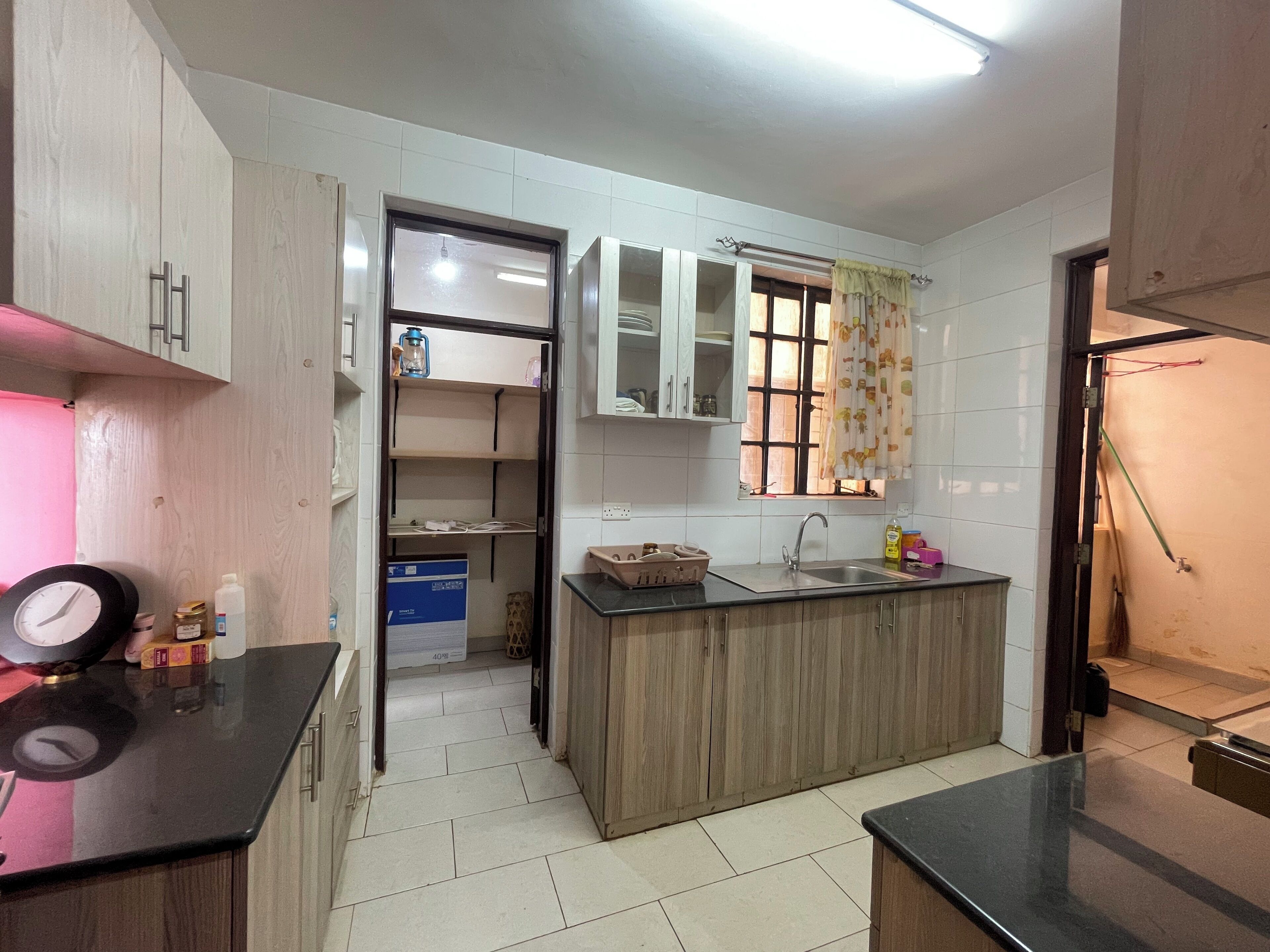 Comfort Apartment | Private kitchen | Fridge, microwave, cookware/dishes/utensils, dining tables