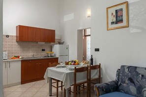 Kitchen and dining area - Family Resort Santa Maria I Apartment 2, Stara Novalja, Croatia (Stara Novalja)