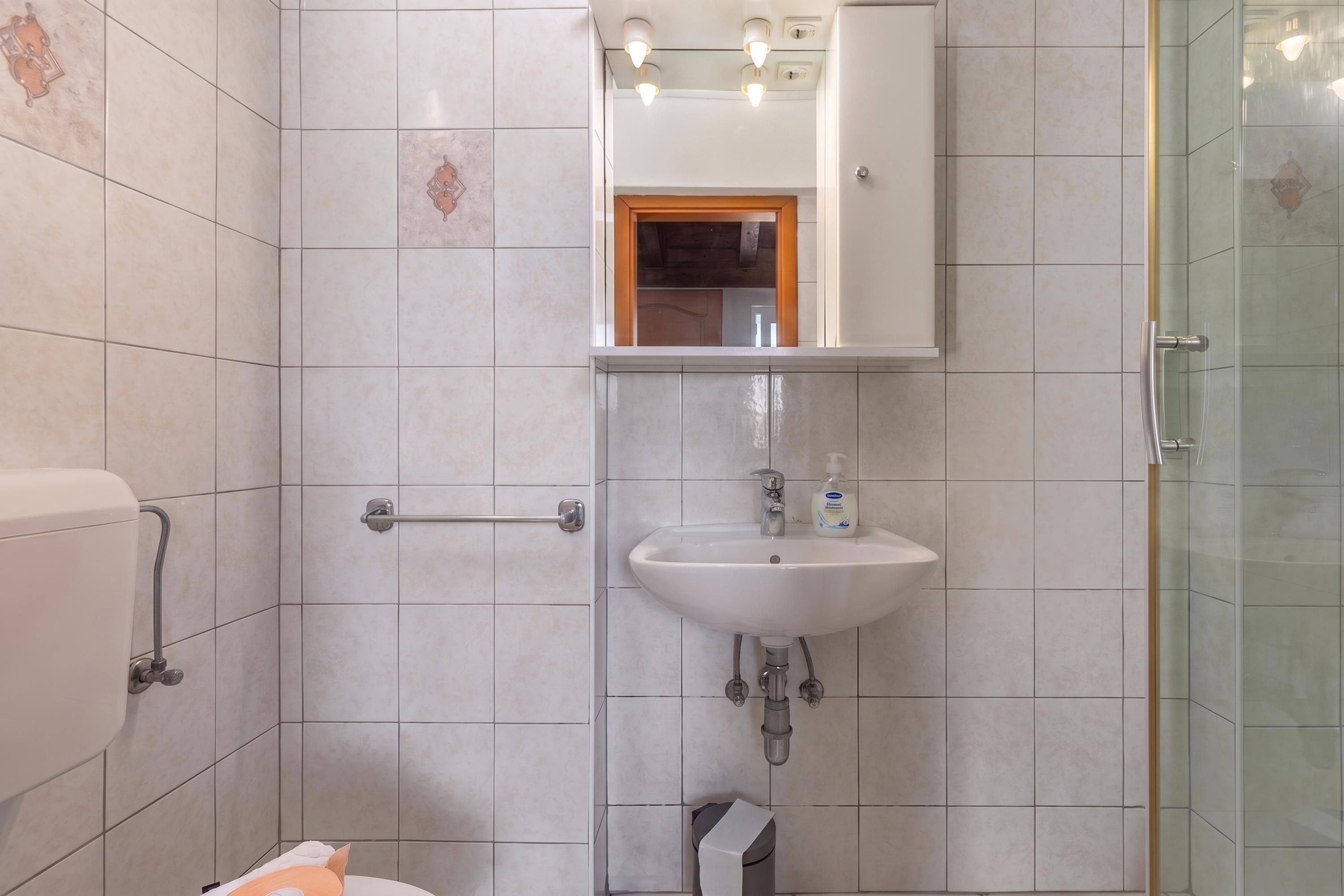 Badkamer met douche
