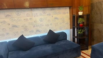Standard Room | Living area | 42-inch LED TV with satellite channels