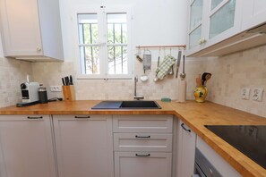 Fridge, oven, cookware/dishes/utensils