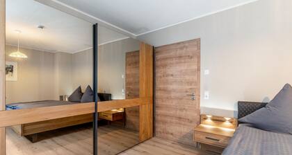 Ferienwohnung 'Im Rosengarten 2' mit Bergblick, privater Terrasse und WLAN