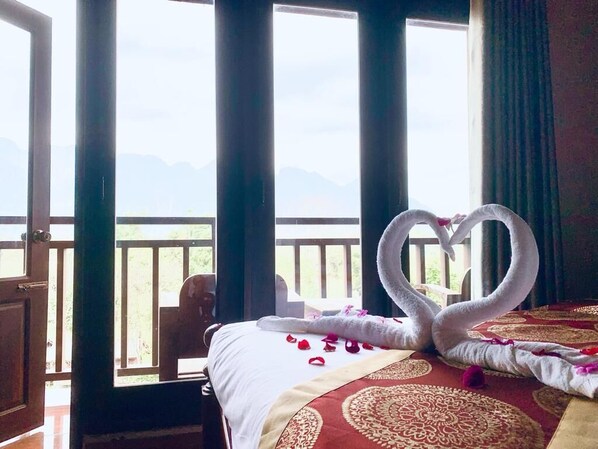 Deluxe Quadruple Room, 4 Bedrooms | Mountain view - Happy Riverview Hotel (Vang Vieng)