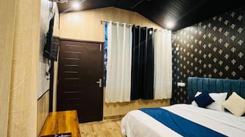 Habitación Deluxe, 1 cama de matrimonio grande | 1 dormitorio, sistema de insonorización, wifi gratis