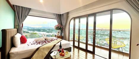 Habitación Deluxe | Ropa de cama de alta calidad y camas con efecto memoria