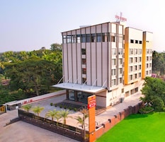 A modern building with a sign reading "UVA MANISH".