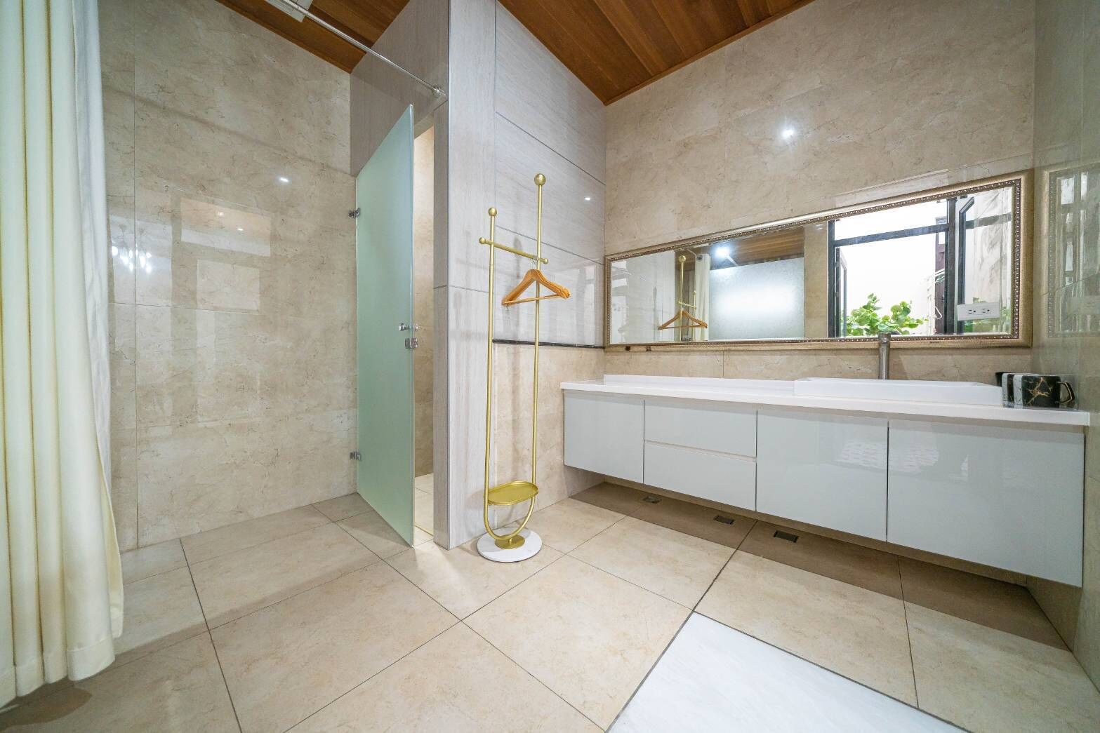 Shower, rainfall showerhead, designer toiletries, hair dryer