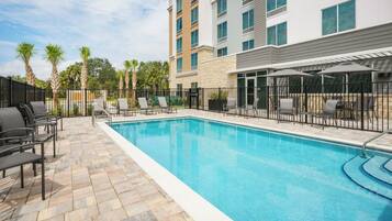 Outdoor pool, open 7:00 AM to 9:00 PM, pool umbrellas, pool loungers