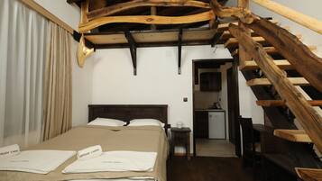 Family Room | Minibar, individually furnished, desk, laptop workspace