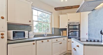 Lake District village cottage sleeping 16 guests in 8 bedrooms with 3 hot tubs