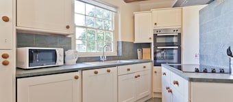 Lake District village cottage sleeping 16 guests in 8 bedrooms with 3 hot tubs