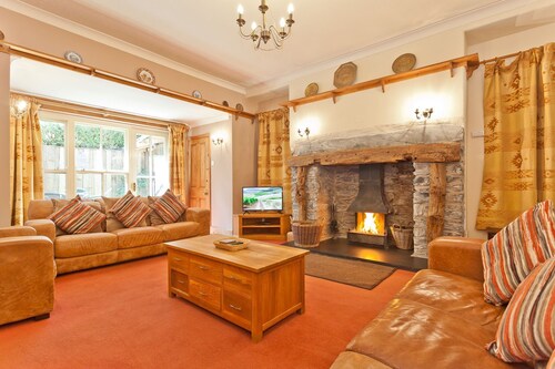 Lake District village cottage sleeping 16 guests in 8 bedrooms with 3 hot tubs
