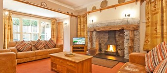 Lake District village cottage sleeping 16 guests in 8 bedrooms with 3 hot tubs