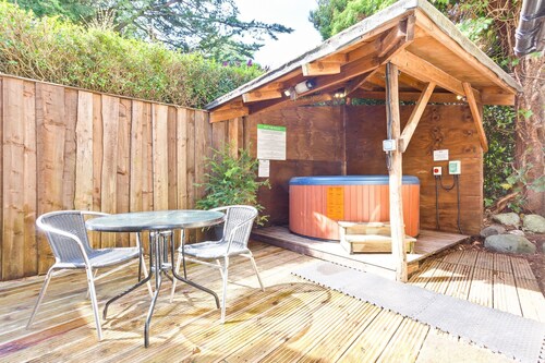 Sleeps 12 guests in 6 bedrooms with 2 hot tubs
